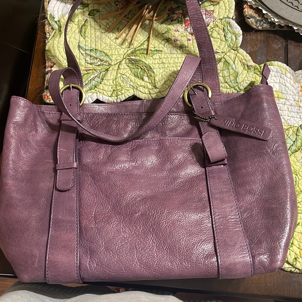 100% leather Nina Bossi purse.